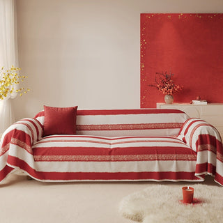 Housse de canapé à rayures rouges et blanches classiques de Noël pour une ambiance de vacances chaleureuse