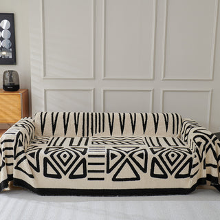Housse de canapé en peluche à motif géométrique