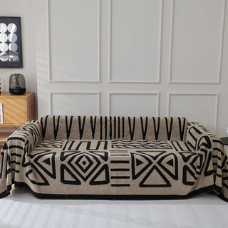 Housse de canapé en peluche à motif géométrique
