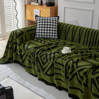 Housse de canapé en peluche à motif géométrique