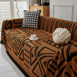 Housse de canapé en peluche à motif géométrique