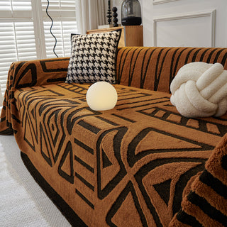 Housse de canapé en peluche à motif géométrique