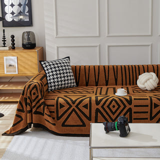 Housse de canapé en peluche à motif géométrique