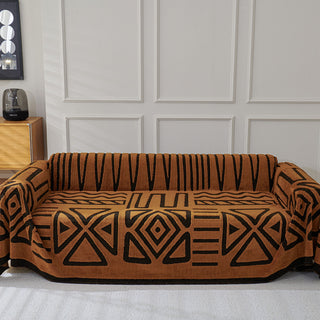 Housse de canapé en peluche à motif géométrique