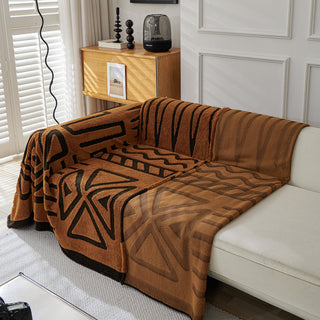 Housse de canapé en peluche à motif géométrique