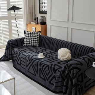 Housse de canapé en peluche à motif géométrique