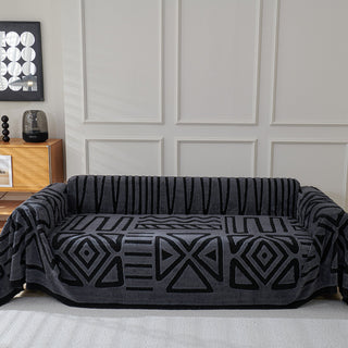 Housse de canapé en peluche à motif géométrique