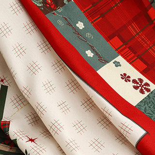 Cette housse de canapé confortable en patchwork de Noël protège les meubles et rehausse la décoration de votre maison de vacances