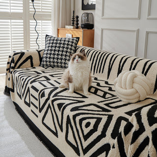 Housse de canapé en peluche à motif géométrique