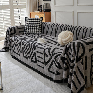 Housse de canapé en peluche à motif géométrique