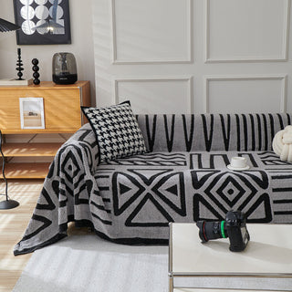 Housse de canapé en peluche à motif géométrique