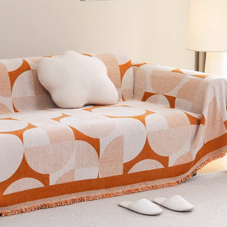 Housse de canapé en forme de cercle géométrique ludique pour un look de salon moderne et dynamique
