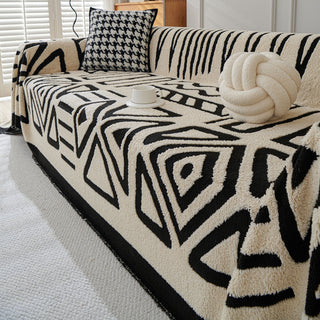 Housse de canapé en peluche à motif géométrique