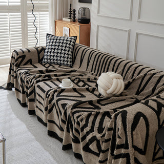 Housse de canapé en peluche à motif géométrique