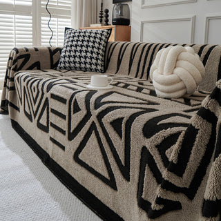 Housse de canapé en peluche à motif géométrique