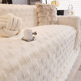 Housse de canapé ultra moelleuse, couleurs nude neutres, confort luxueux et intemporel et design douillet pour un style et une chaleur tout au long de l'année