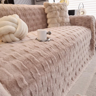 Housse de canapé ultra moelleuse, couleurs nude neutres, confort luxueux et intemporel et design douillet pour un style et une chaleur tout au long de l'année