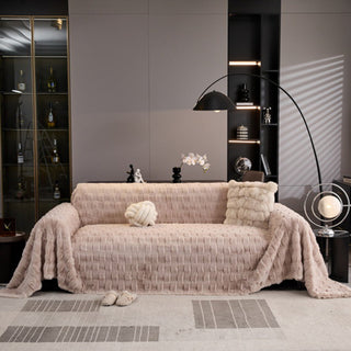 Housse de canapé ultra moelleuse, couleurs nude neutres, confort luxueux et intemporel et design douillet pour un style et une chaleur tout au long de l'année