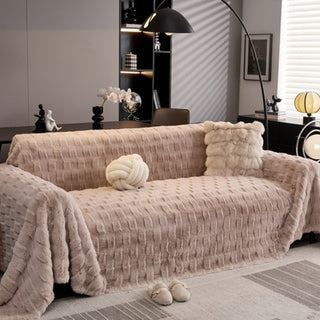 Housse de canapé ultra moelleuse, couleurs nude neutres, confort luxueux et intemporel et design douillet pour un style et une chaleur tout au long de l'année